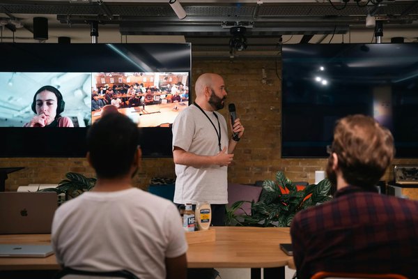 What are some strategies to enhance teamwork in multiplayer video games?